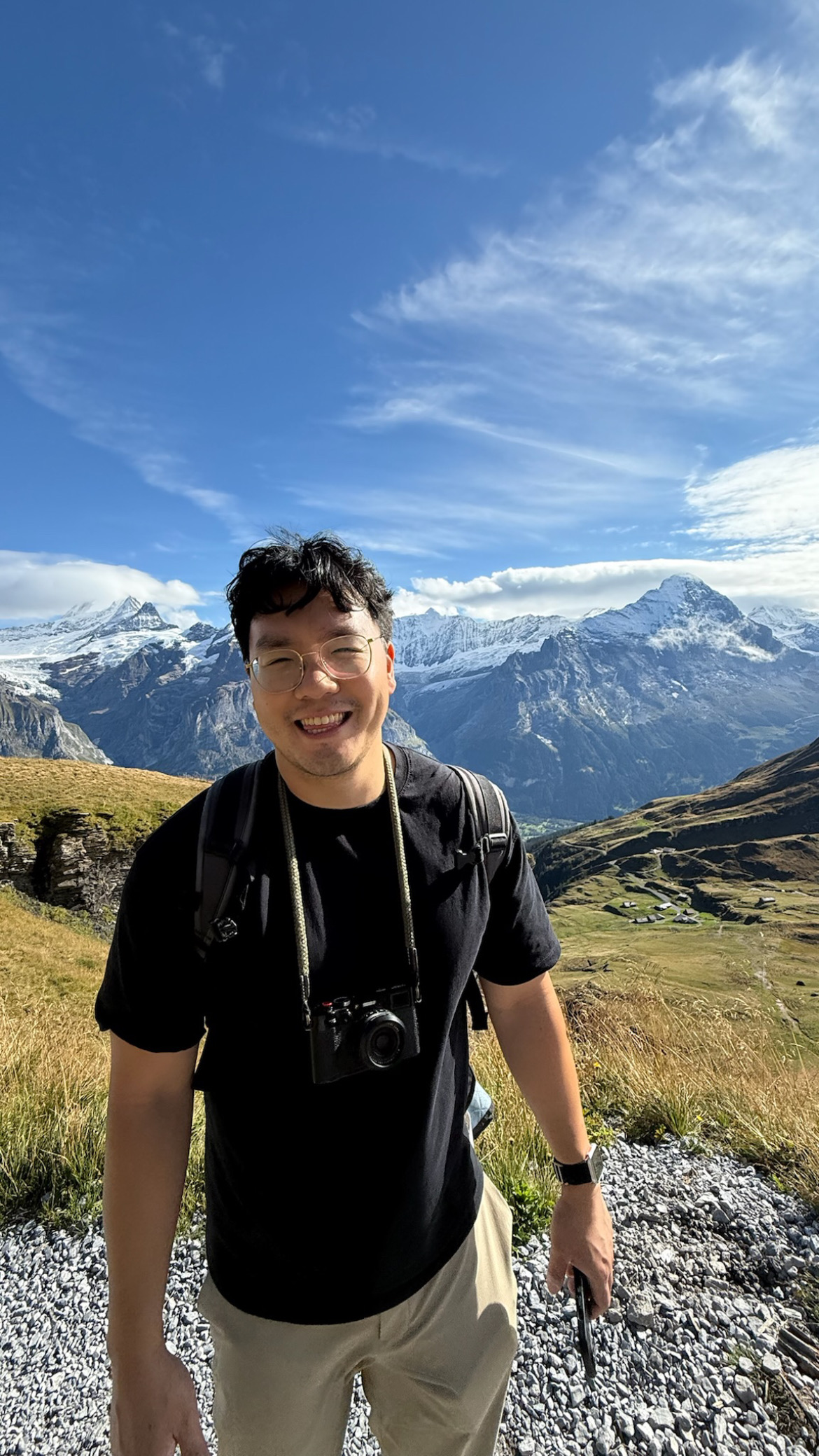 David smiling in the mountains